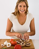 Woman Cutting Vegetables